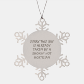 Mortician Gifts from Friends for Christmas - Snowflake Ornament with 'Sorry This Guy Is Already Taken By A Smokin' Hot Mortician' Quote, Durable Stainless Steel, 3.14 inches - Image 1